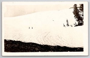 RPPC Two Men In Snow Beautiful Hillside Real Photo c1910 Postcard W29