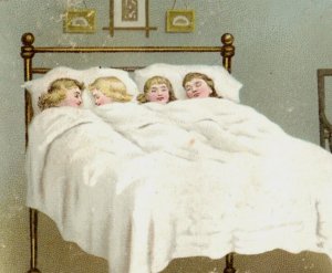 1870s-80s Victorian Christmas Card Sweet Children Sleeping In Bed F166