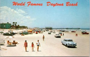 Postcard FL Daytona Beach - World's Most Famous - Cars and bathers on beach