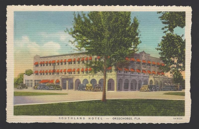 Southland Hotel, Okeechobee, Florida. Vintage autos outside