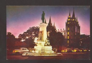 SALT LAKE CITY UTAH BRIGHAM YOUNG MONUMENT OLD CARS AT NIGHT VINTAGE POSTCARD