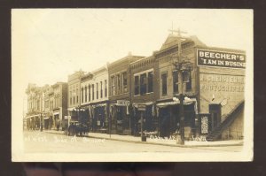 RPPC CLARINDA IOWA DOWNTOWN STREET SCENE STORES REAL PHOTO POSTCARD 1912