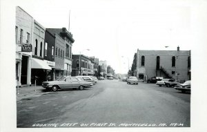 RPPC Postcard First Street Looking East, Monticello IA Jones County LL Cook 119M