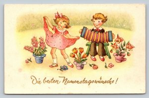 Boy Plays Accordion While Girl Dances Best Name Day Wishes Vintage Postcard 1113