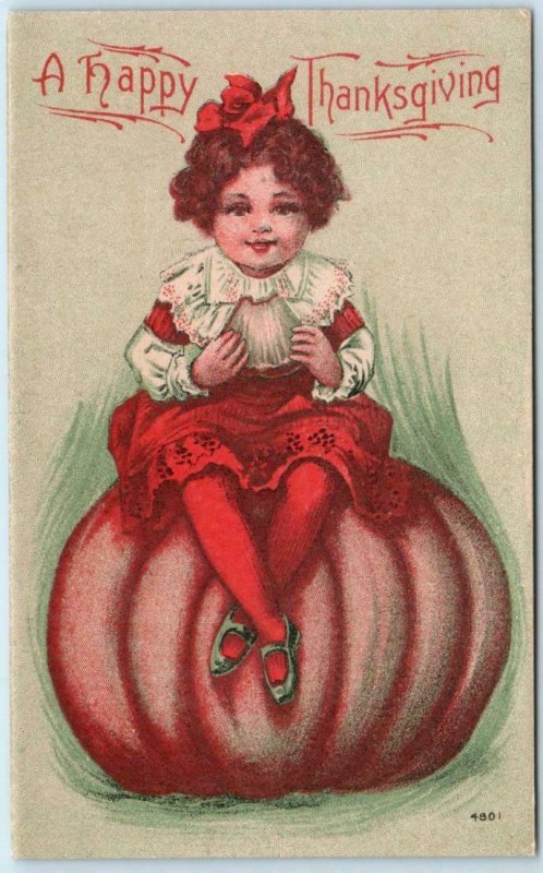 HAPPY THANKSGIVING  Little Girl on Top of PUMPKIN ca 1910s  Postcard 