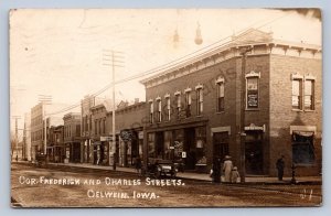 J90/ Oelwein Iowa RPPC Postcard c1910 Frederick Charles Sts Stores 282