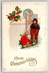 Holiday~2 Girls On Sled & Holly Hearty Christmas Wishes~Vintage Postcard