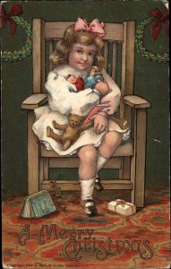 Christmas Children Girl Rocking Chair Holding Toys Embossed c1900s-10s Postcard