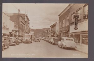 Roseburg OREGON RPPC c1950 MAIN STREET Stores ADVERTISING Delivery Truck OR