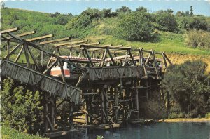 Universal City Studios California 1975 Postcard Glamor Train Collapsing Bridge