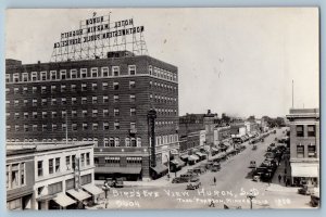 Huron South Dakota SD Postcard RPPC Photo Bird's Eye View Hotel Jewelry Hardware