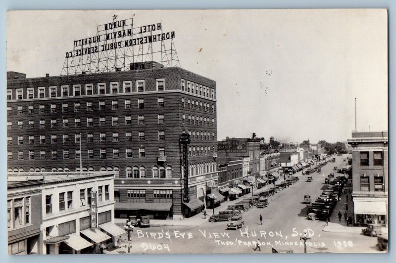 Huron South Dakota SD Postcard RPPC Photo Bird's Eye View Hotel Jewelry Hardware