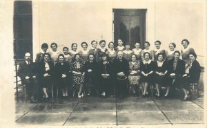 Postcard girl students in uniforms group photo with the teachers