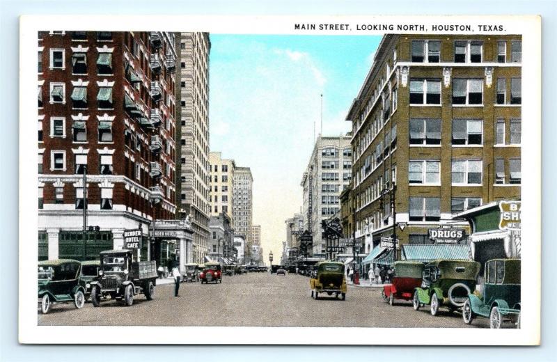 Postcard TX Houston Main Street Looking North Old Cars Drug Store c1930s J3