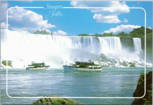 Niagara Falls - Maid of the Mist tour boats passing below American Falls