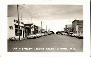 RPPC Main Street Looking South Wisher ND Businesses Red Owl Vintage Postcard E58