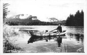 ALASKA Native in Dugout Canoe RPPC  Real Photo postcard 