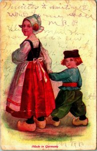 Made in Germany Dutch Girl Maid Boy Wood Clogs Holding Hands 1909 Postcard