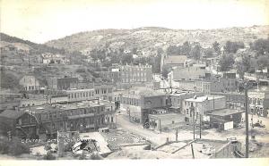 Central City CO Aerial View Store Front's Signed Maner RPPC Postcard