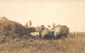 H8/ Interesting RPPC Postcard c1910 Farming Harvest Scene Wagons Farmer1