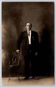 RPPC Dapper Gentleman Posing With Ice Cream Parlor Chair Real Photo Postcard J34