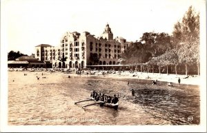 Real Photo Postcard Outrigger Canoe Boat Royal Hawaiian Hotel in Honolulu Hawaii