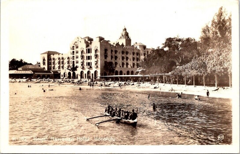 Real Photo Postcard Outrigger Canoe Boat Royal Hawaiian Hotel in Honolulu Hawaii