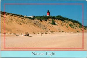 Cape Cod, Massachusetts lighthouse - Nauset Light with person on beach