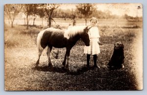 J93/ Interesting RPPC Postcard c1910 Pretty Girl Pony Pet Dog 325