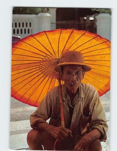 Postcard A Chinese elderly man and his paper umbrella, Penang, Malaysia