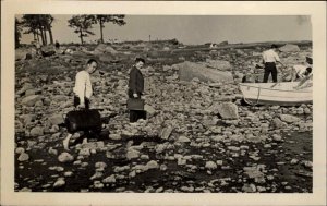 Men Boat & Rocks- Green Lake NY Written on Back Real Photo Postcard