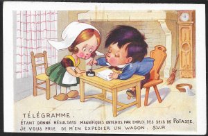 Boy with Dutch girl at Desk Writing Telegram Potash Salts FRANCE Unused c1910s