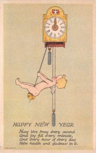 New Year Greetings Angel Cherub Swinging on Clock Vintage Postcard AA70494