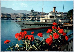 VINTAGE POSTCARD CONTINENTAL SIZE HARBR AT LAKE GENEVA WITH CITY CITY VIEW
