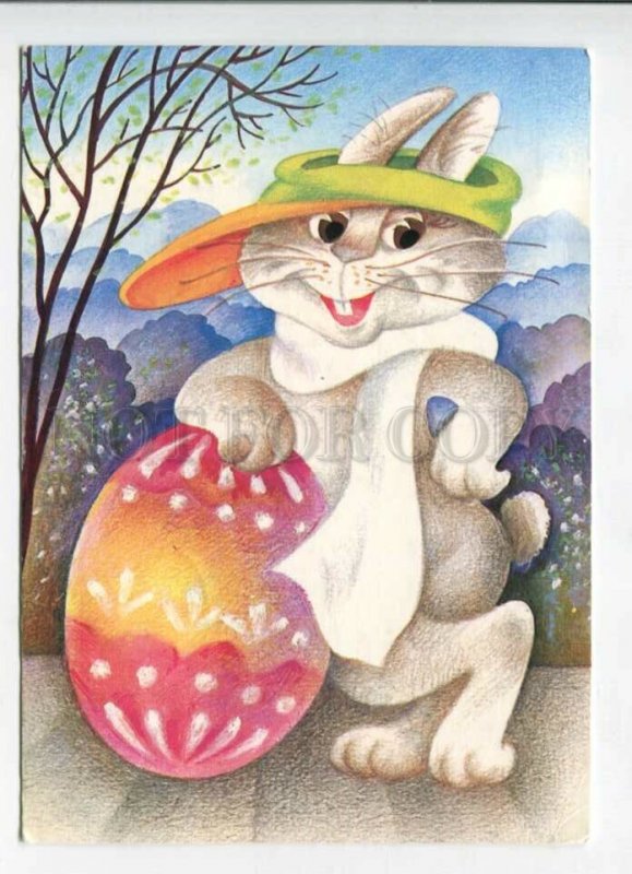 429358 ESTONIA Easter bunny an egg Ulle Meister 1994 RPPC Kuma advertising label