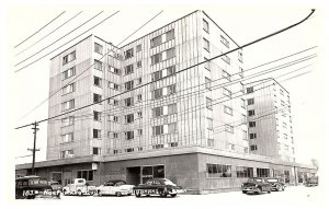 RPPC Postcard Northward Building Fairbanks Alaska w Old Cars Electrical Pole