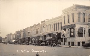 J68/ Clarinda Iowa RPPC Postcard c1910 South Side Stores State Bank 107