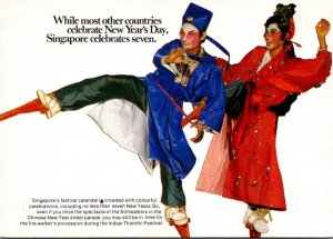 Singapore Celebrates Seven New Years Showing Stiltwalkers In Chinese New Year...