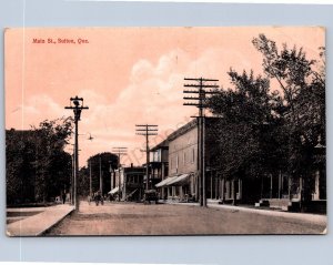 K49/ Sutton Quebec Canada Postcard c1910 Main Street Stores Wagon 376