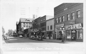 J69/ Ames Iowa RPPC Postcard c40-50s Main Street Stores 198