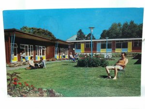 Holidaymakers Relax by Chalets Pontins Holiday Village Hemsby Vtg Postcard 1981