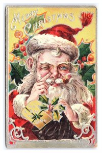Winking Santa Claus Smoking Pipe Red Robe Present Merry Christmas Postcard