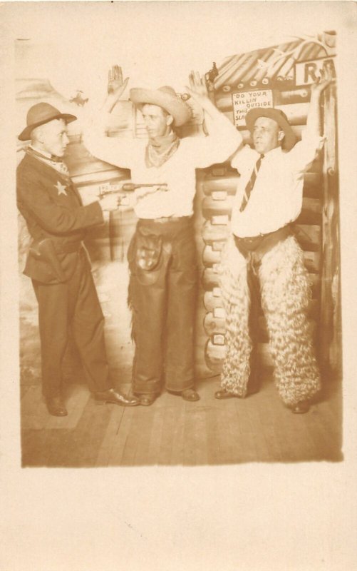 H31/ Interesting RPPC Postcard c1910 Cowboy Studio Holdup Gun Chaps Sheriff 21