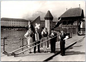 VINTAGE POSTCARD CONTINENTAL SIZE REAL PHOTO OF THE EDELWEISS FOLK-LORE GROUP