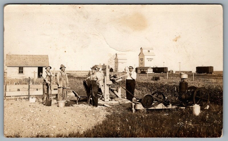 RPPC 1910s Western Canada Ogilvie's Grain Elevator Gas Engine Box Railcars