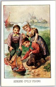 Sending Dolly Fishing Children Playing In The Ocean Windmill Background Postcard