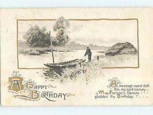 Divided-Back birthday MAN WITH SMALL BOAT AT SHORELINE o6933