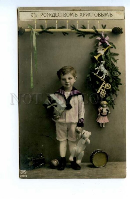 494451 CHRISTMAS Boy w/ Toys TEDDY BEAR Doll TRAIN Horse DRUMM PHOTO 1915 year