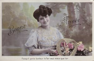 RP: NEW YEAR, PU-1909; Bonne Annee,  Woman holding bouquet of flowers