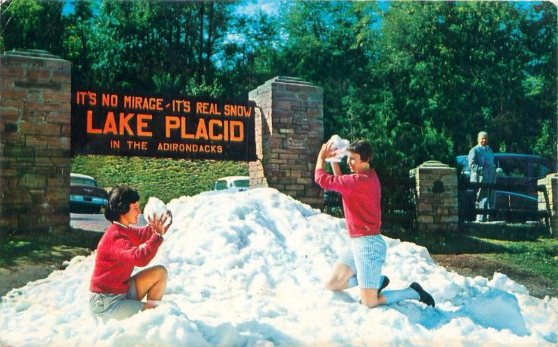 LAKE PLACID NEW YORK NO MIRACLE ITS REAL SNOW POSTCARD WOMEN HAVE SNOWBALL FIGHT